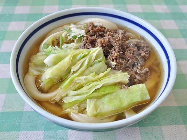 吉田のうどん(translated "吉田のうどん" to French): "Les Nouilles de la Sérénité"