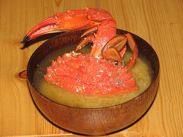 カニ汁(translated "カニ汁" to French): "L'Élixir de Mer Écarlate"