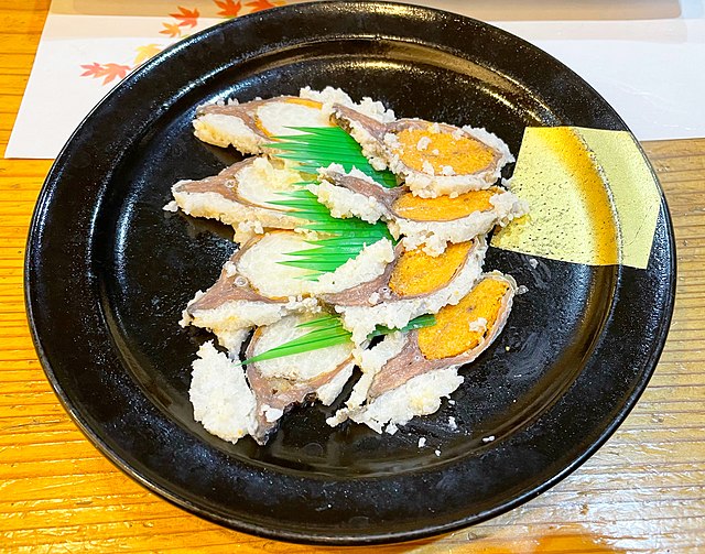 鮒寿司 (translated "鮒寿司" to French): "Mélodie de Poisson Fermenté"