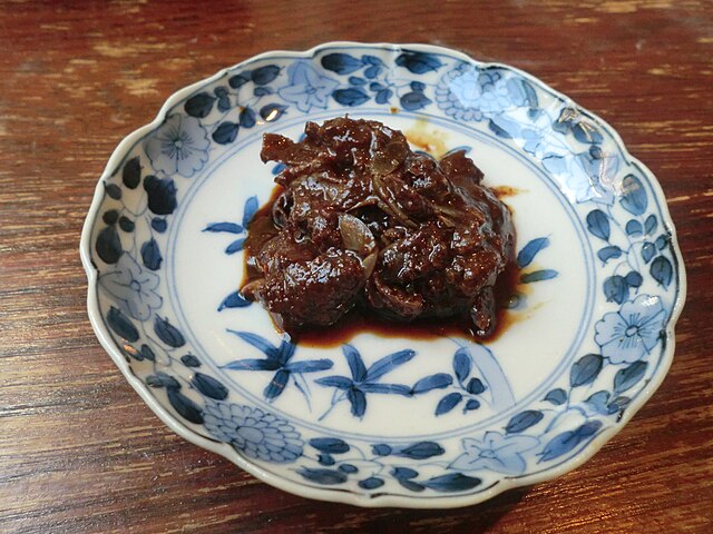 がん漬 (translated "がん漬" to French): "Sérénité de la Mer Épicée"